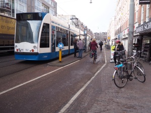 A floating tram stop allows cycling and transit to coexist efficiently